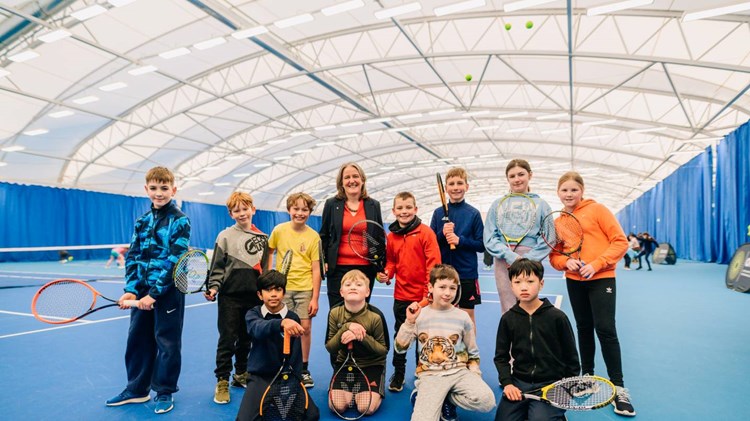Kids on court at the opening of the Oriam Indoor Tennis Centre