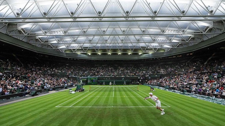 Andy Murray plays against Nikoloz Basilashvili in their men's singles first round match of the 2021 Wimbledon Championships 