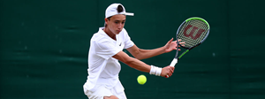 Patrick Brady playing a slice backhand at Wimbledon