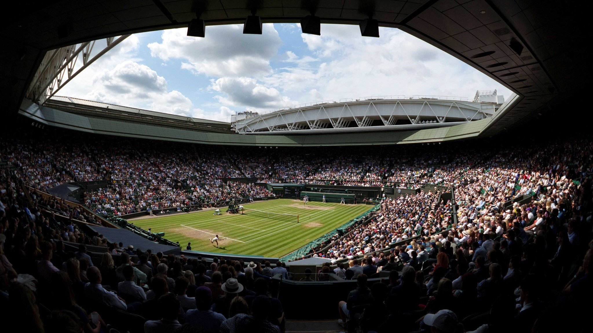 View of Wimbledon Centre Court with a full stadium of fans