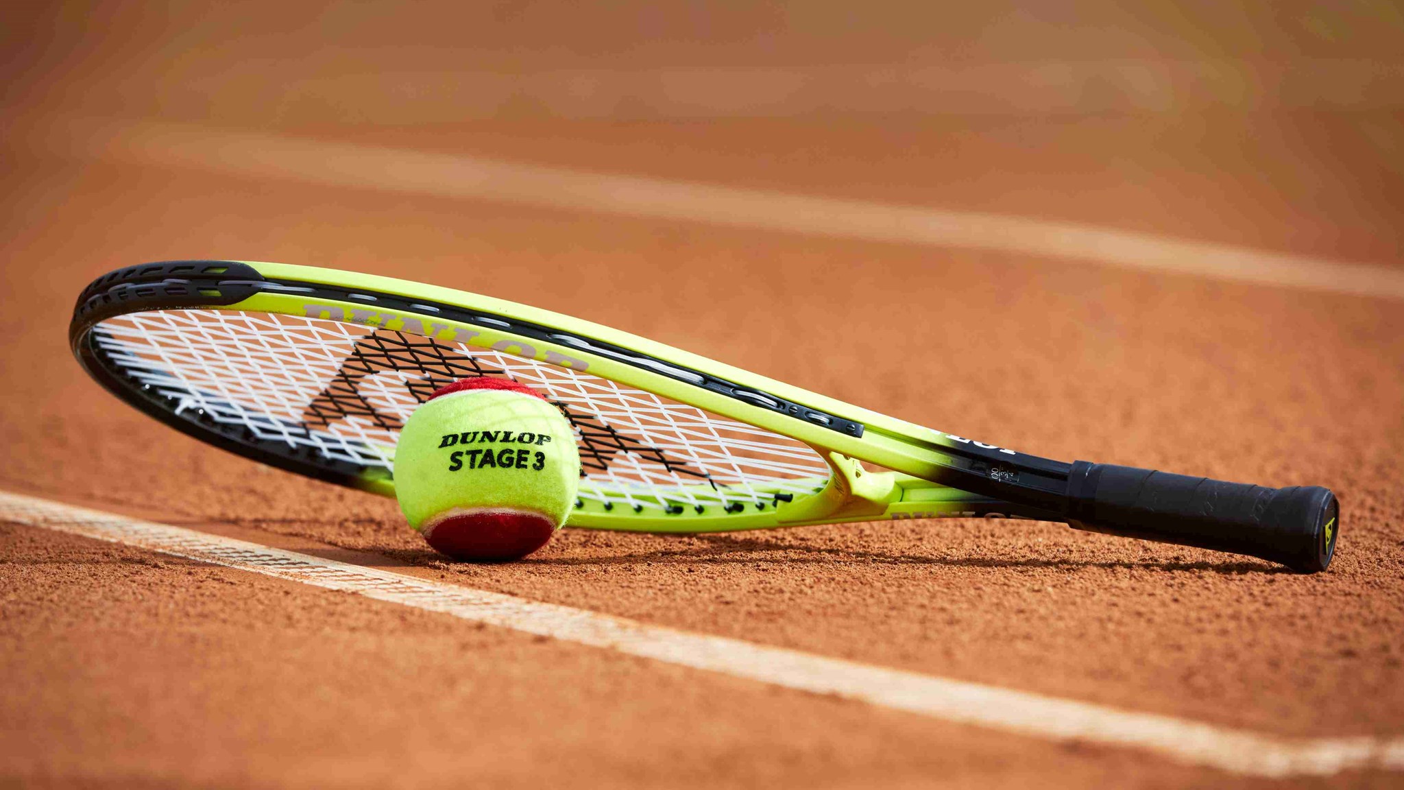 Tennis ball and racket