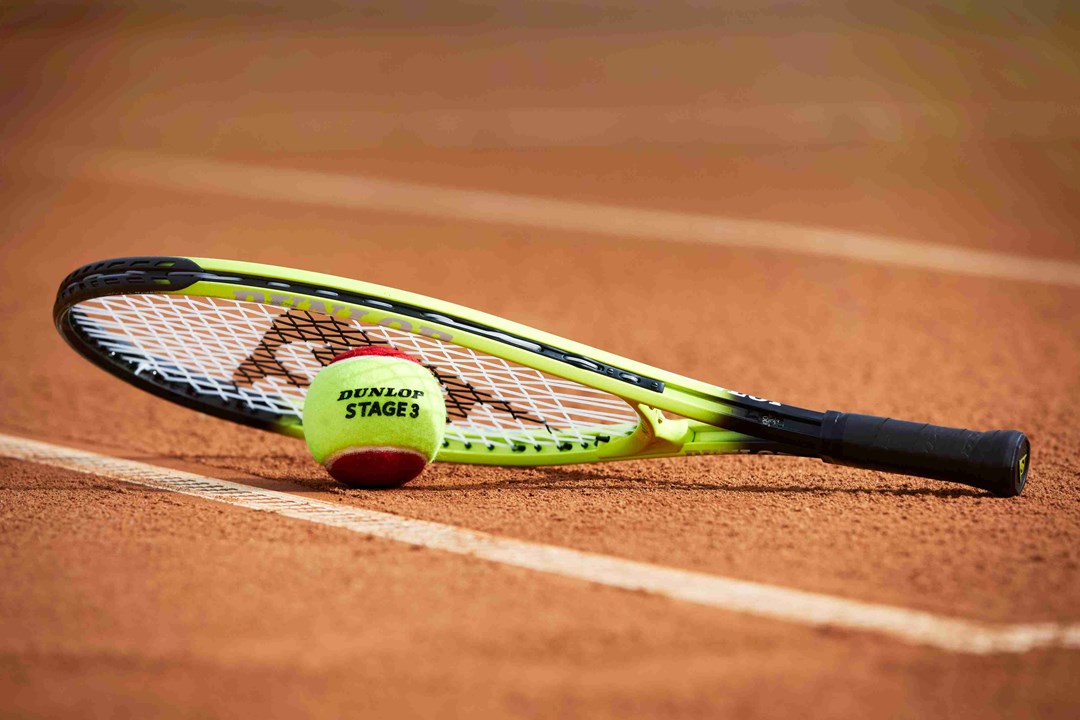 Tennis ball and racket