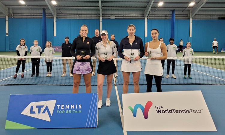 Freya Christie and Ali Collins with the W60 Sunderland doubles trophy