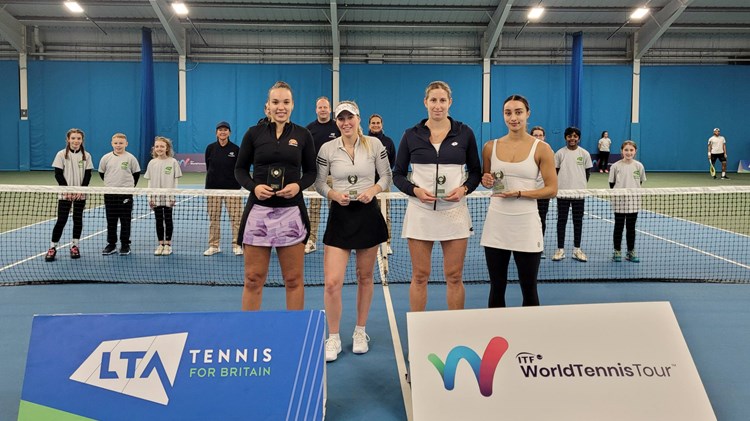 Freya Christie and Ali Collins with the W60 Sunderland doubles trophy