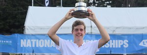 Will Jansen holding up the winning trophy at the National Championships