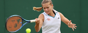 Matilda Mutavdzic playing a forehand tennis shot in a tournament