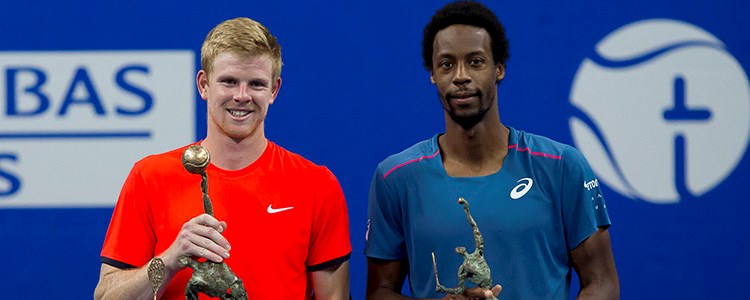 Kyle Edmund holding winning trophy next to Gael Monfils in Antwerp