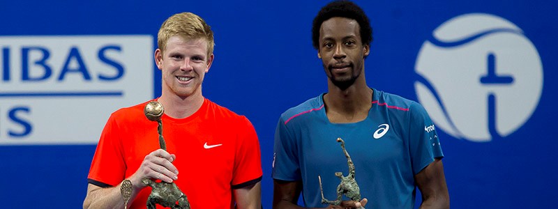 Kyle Edmund holding winning trophy next to Gael Monfils in Antwerp