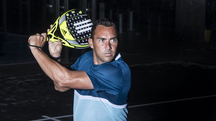 Richard Brooks playing a backhand padel shot