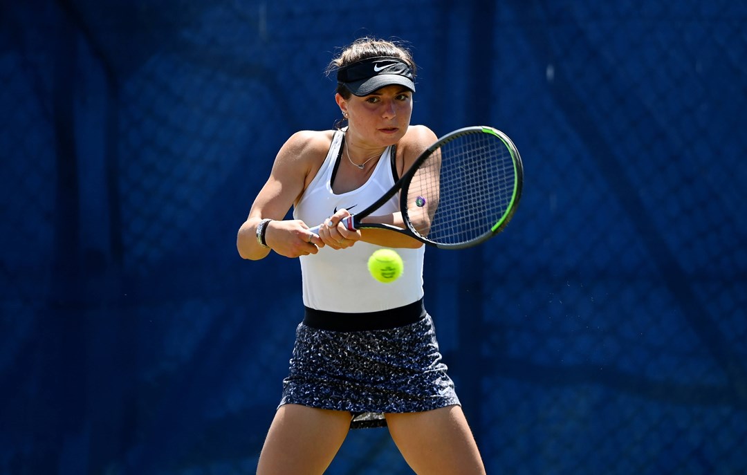Amy Leather hits a backhand during her match against Jaquelyn Ogunwale during the 2021 Junior National Tennis Championships