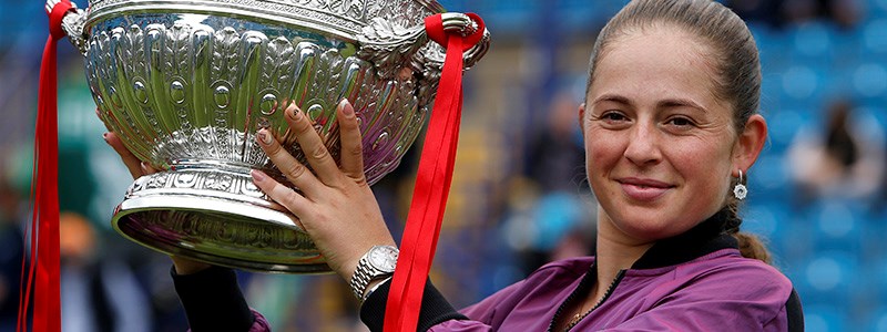 Jelena Ostapenko women's champion holding the 2021 Eastbourne trophy