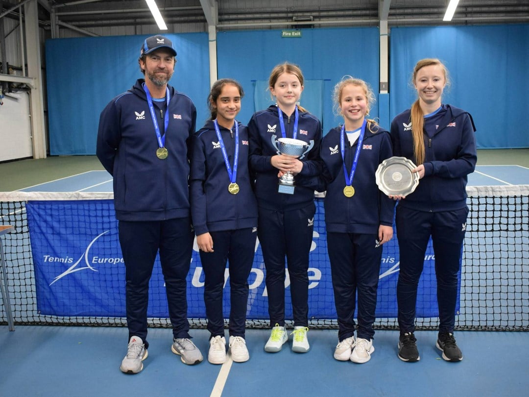 The 12U GB girls team with the Winter Cup trophy in Sunderland