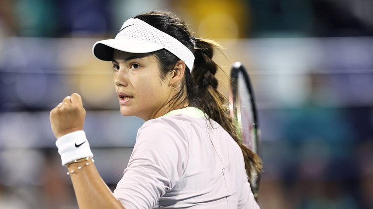 Emma Raducanu clenching her fist in celebration on court at the Abu Dhabi Open