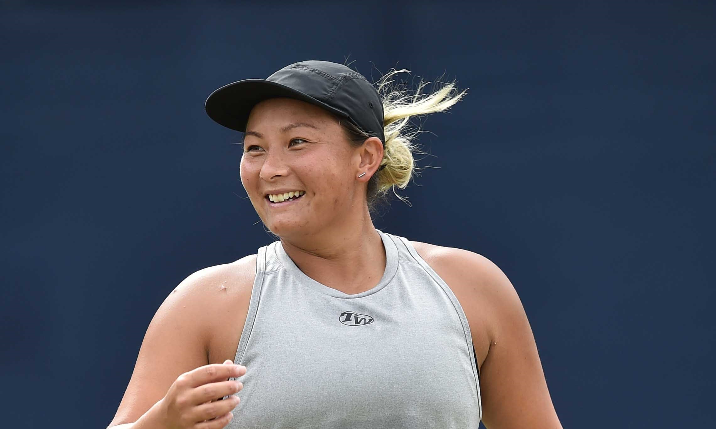 Tara Moore smiling on court at Nottingham Open 2021