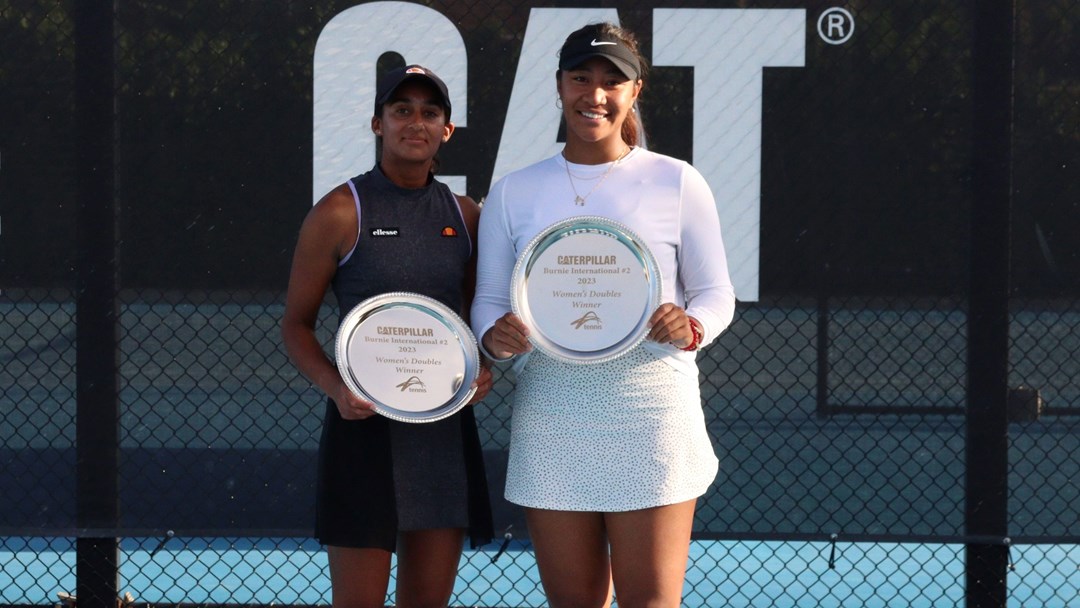 Britain's Naiktha Bains and Australia's Destanee Aiava pictured with their trophies after winning the W25 Burnie doubles event