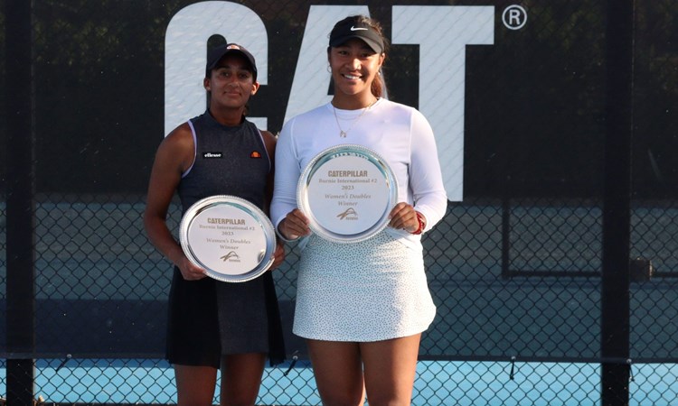 Britain's Naiktha Bains and Australia's Destanee Aiava pictured with their trophies after winning the W25 Burnie doubles event