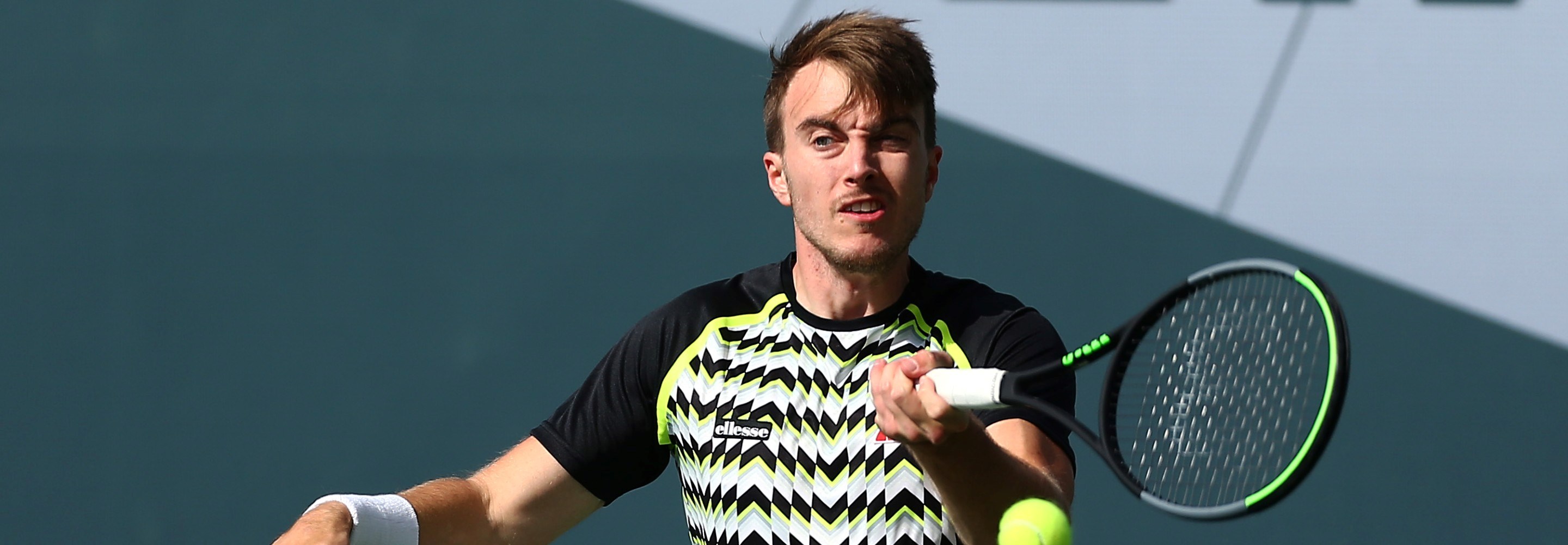 Dermot Bailey of Great Britain plays a forehand during his match against Gordon Reid of Great Britain during the LTA Wheelchair Tennis Tournament at the National Tennis Centre on September 01, 2020 
