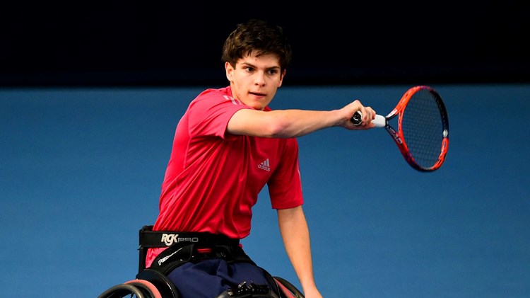 Greg Slade hits a forehand at the 2020 Wheelchair Team Battle