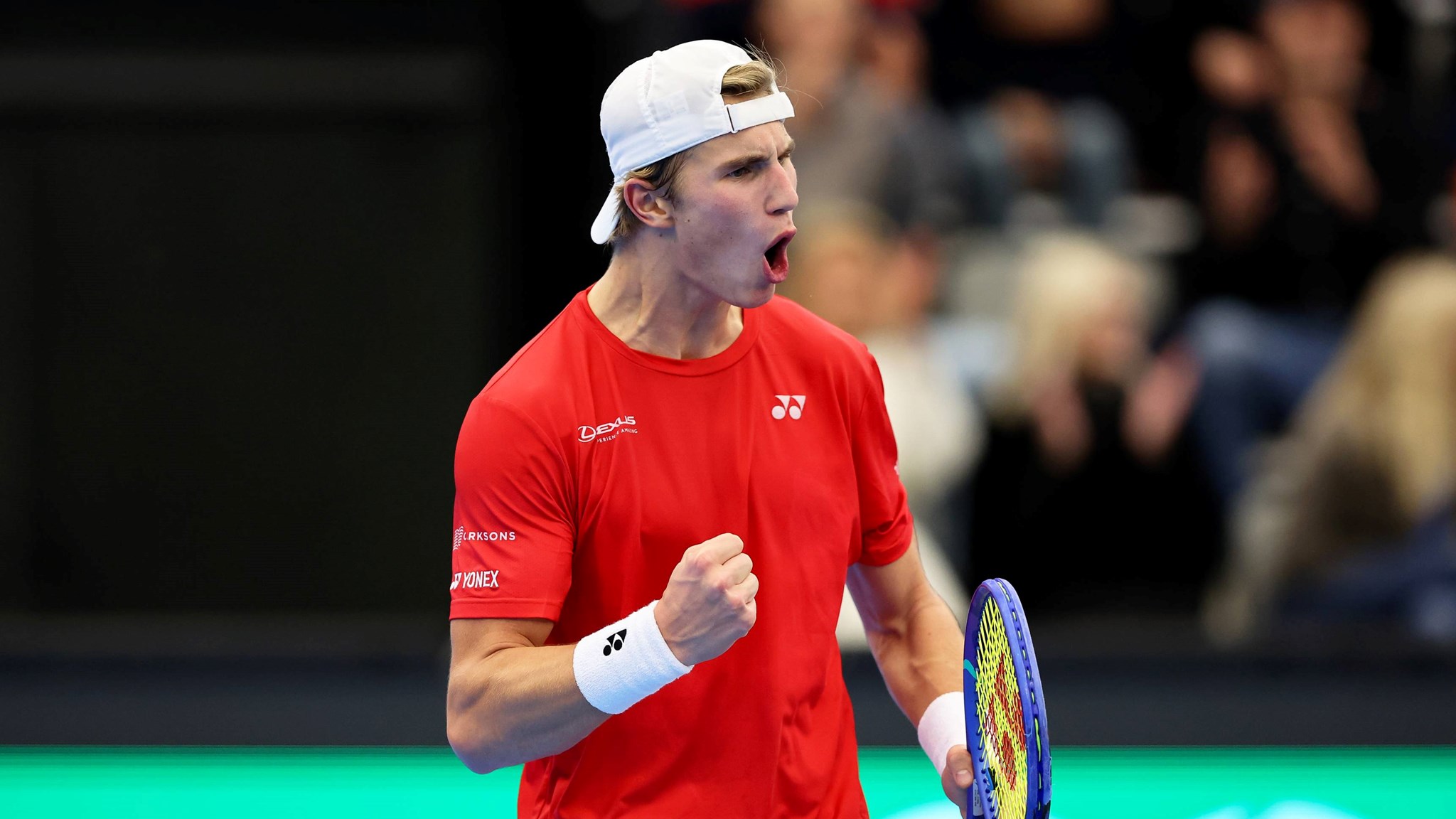 Nicolai Budkov Kjaer celebrates a victory for Norway at the Davis Cup