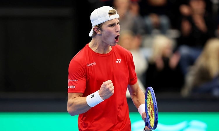 Nicolai Budkov Kjaer celebrates a victory for Norway at the Davis Cup