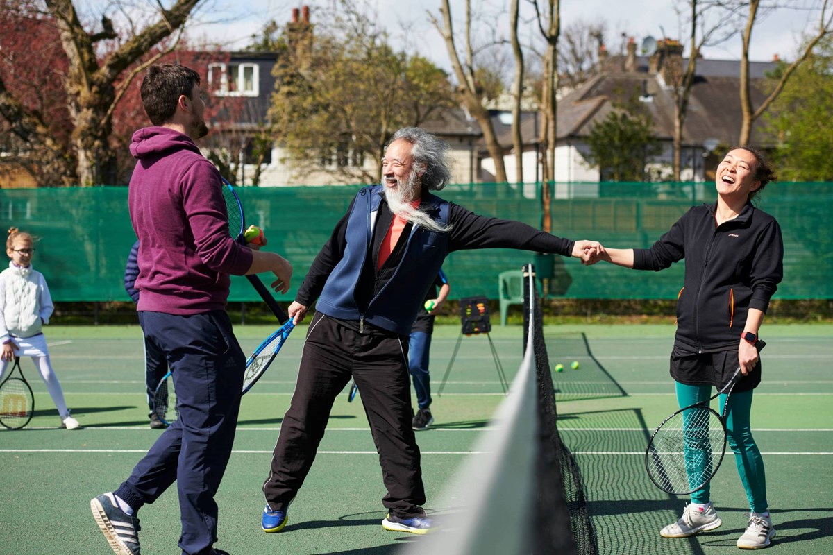 Players-laughing-shaking-hands-on-court.jpg