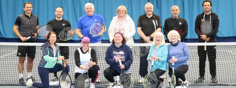 A group photo of players taking part in the Tennis4RAd 10-week pilot course of tennis-based fitness classes.