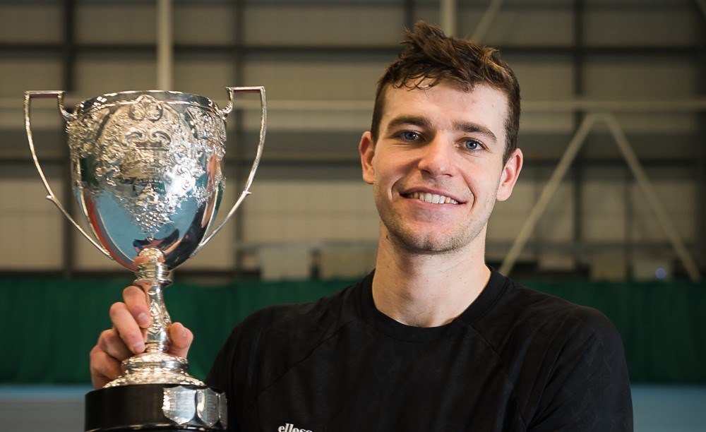 Alastair Gray holding the men's singles trophy for the Glasgow $25k.