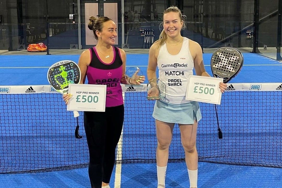 Tia Norton and Aimee Gibson with the Surge Padel British Tour title