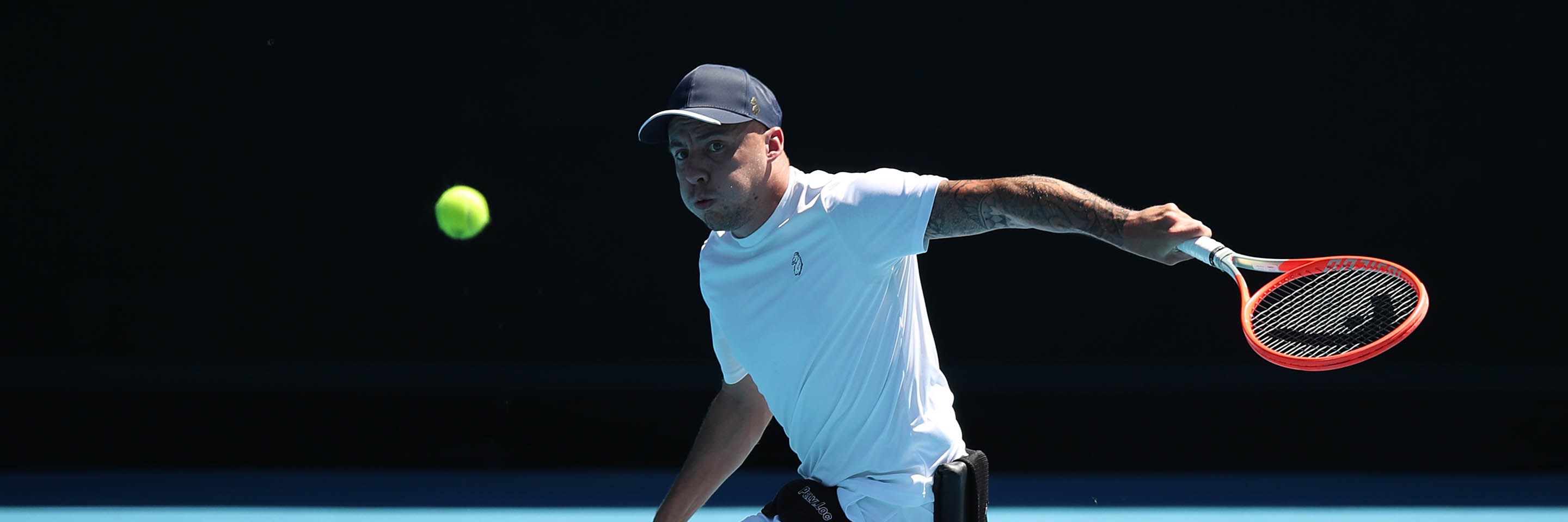 Andy Lpathorne hits a slice backhand at the 2022 Australian Open