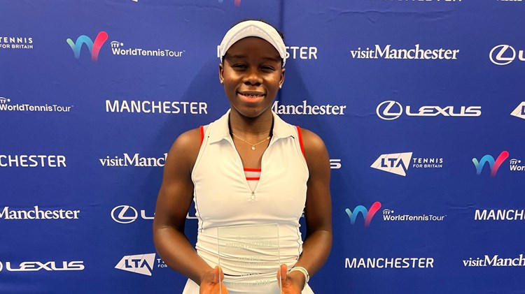 Victoria Mboku - singles champion at the Lexus GB Pro Series Manchester - holding her trophy after winning