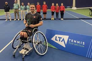 Gordon Reid holding the Bolton Indoor ITF2 singles title