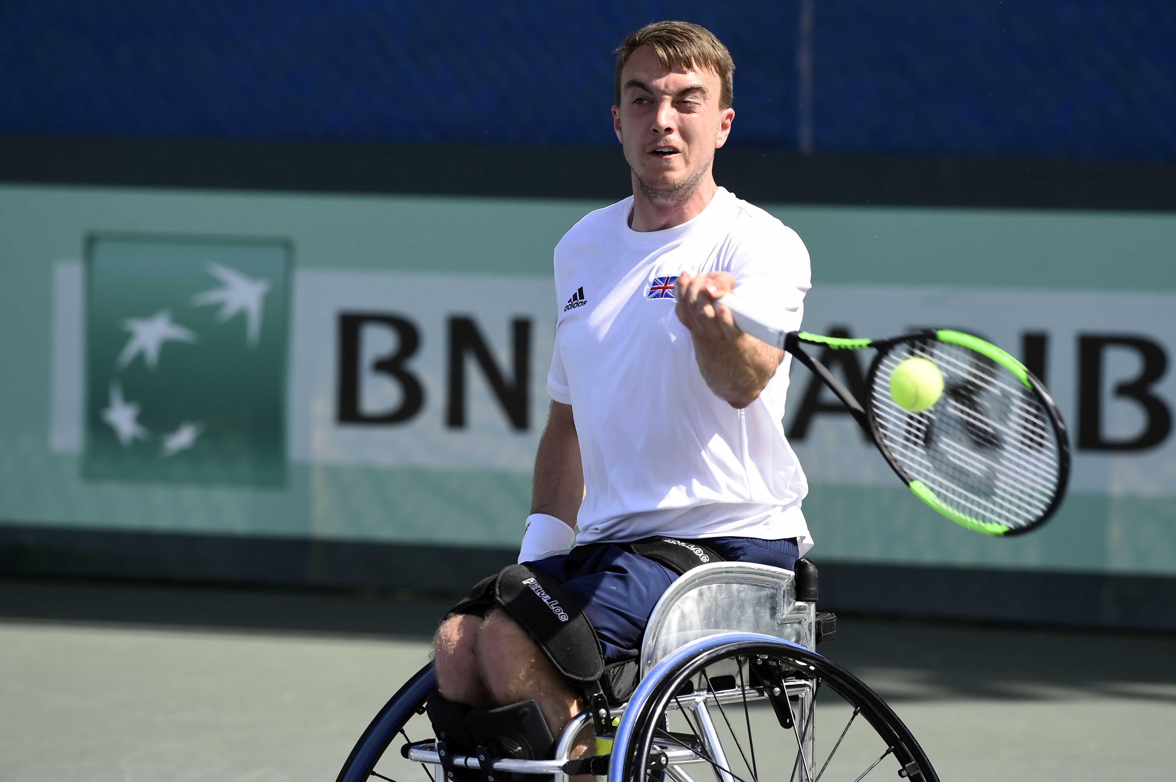 Dermot Bailey hitting a forehand