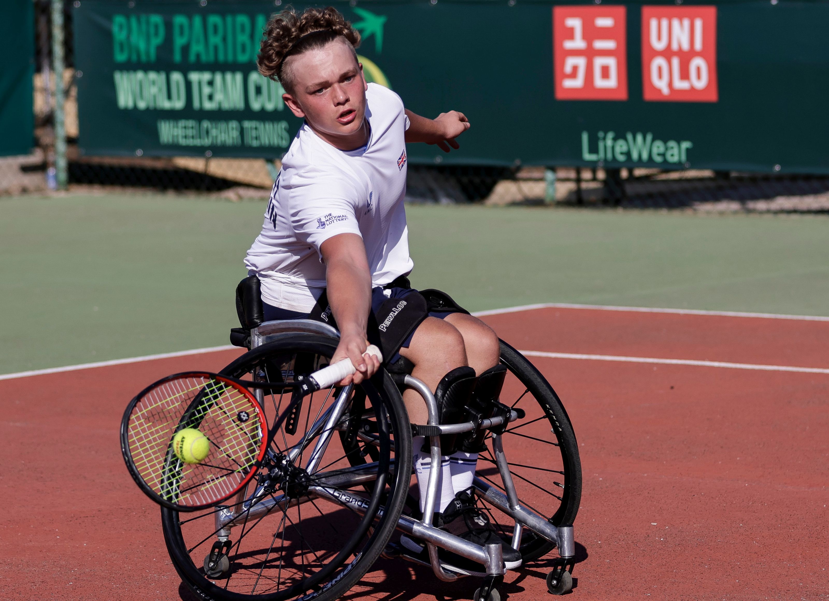 Ben Bartram hitting a forehand 