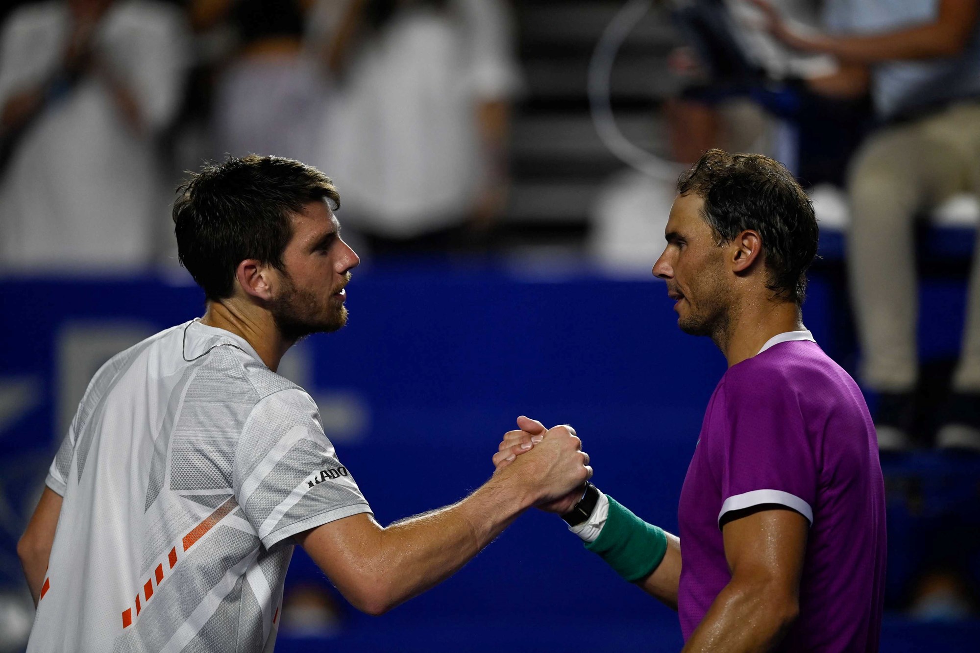 Cam Norrie and Rafael Nadal shake hands at the end of the final in Acapulco