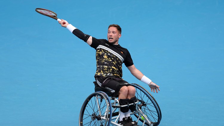 Great Britain's Alfie Hewett hitting a backhand on court in his wheelchair at the 2024 Australian Open