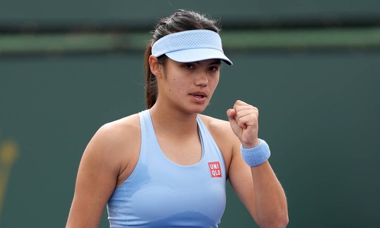 Emma Raducanu, clenching her fist in celebration after winning a point at the BNP Paribas Open Indian Wells 