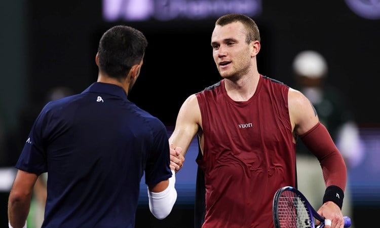 Jack Draper shakes hands with Novak Djokovic after his fourth round win in Indian Wells