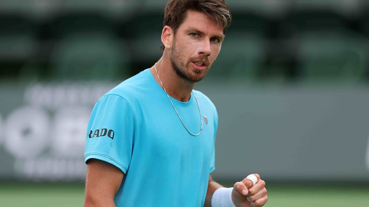 Cam Norrie fist bumping after a shot at Indian Wells
