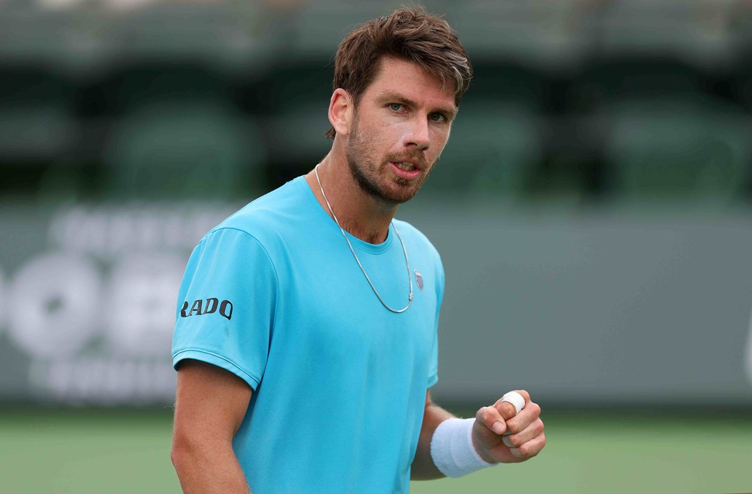 Cam Norrie fist bumping after a shot at Indian Wells