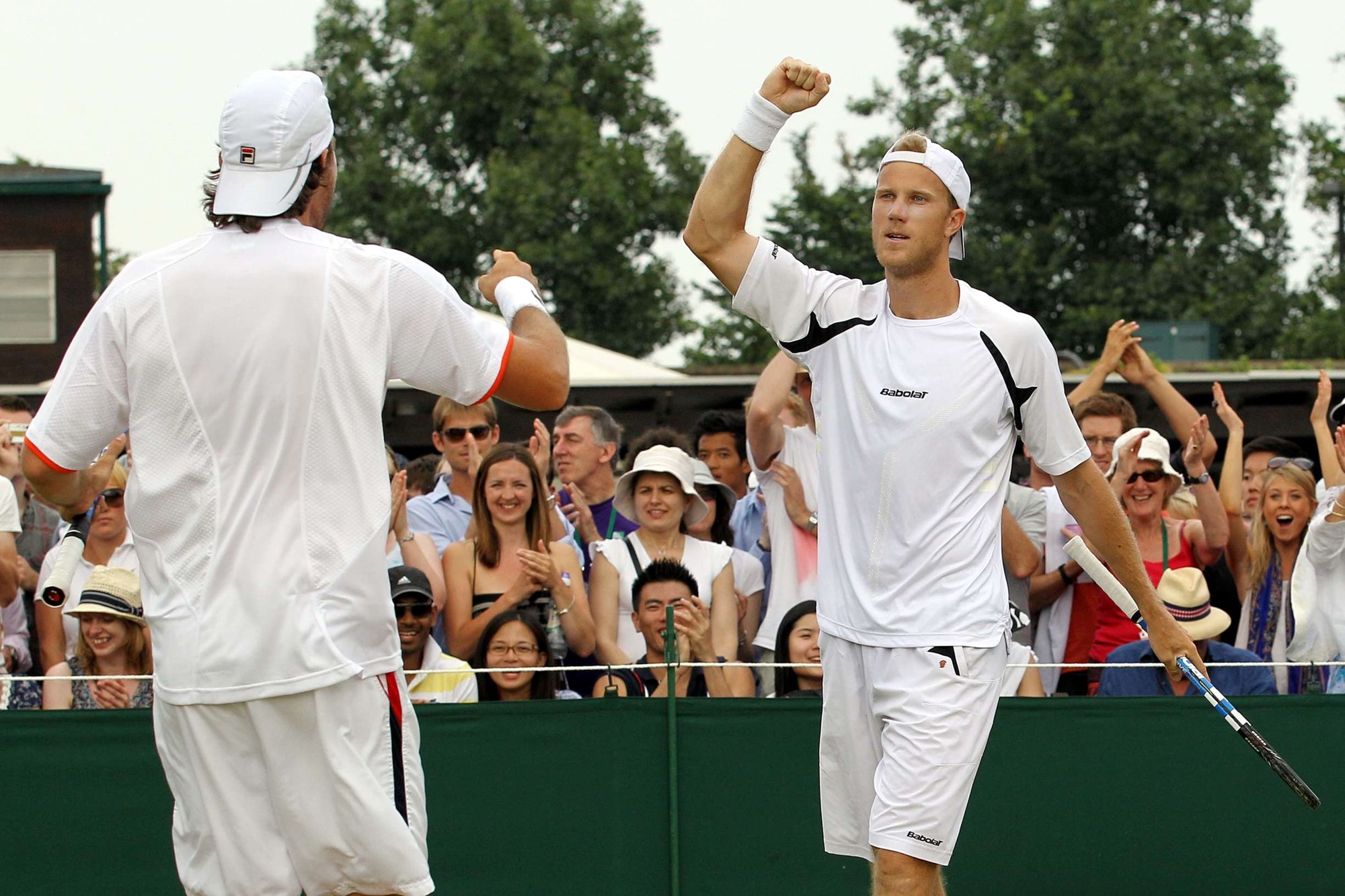 Dom Inglot and Chris Eaton celebrating a win at Wimbledon in 2010