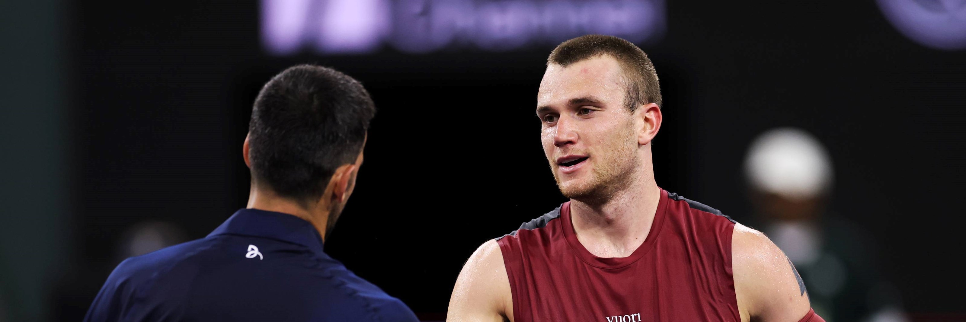 Jack Draper shakes hands with Novak Djokovic after his fourth round win in Indian Wells