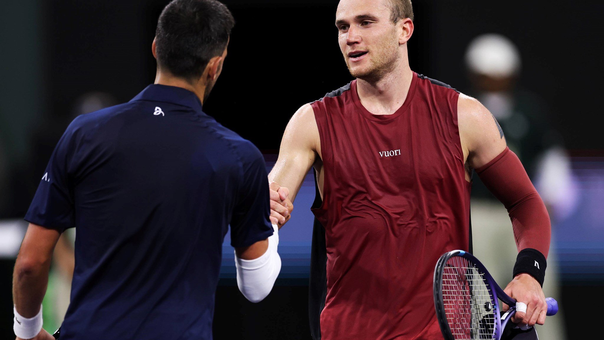 Jack Draper shakes hands with Novak Djokovic after his fourth round win in Indian Wells