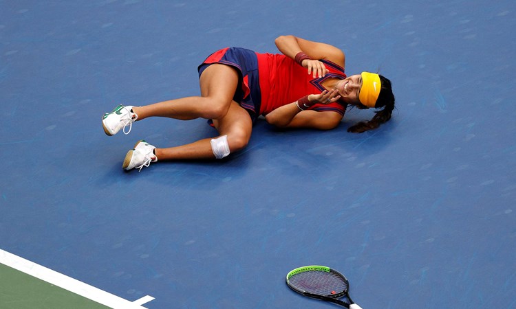 Emma Raducanu collapses in celebration in the US Open final