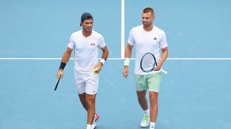Lloyd Glasspool and Jean-Julien Rojer competing at the Australian Open