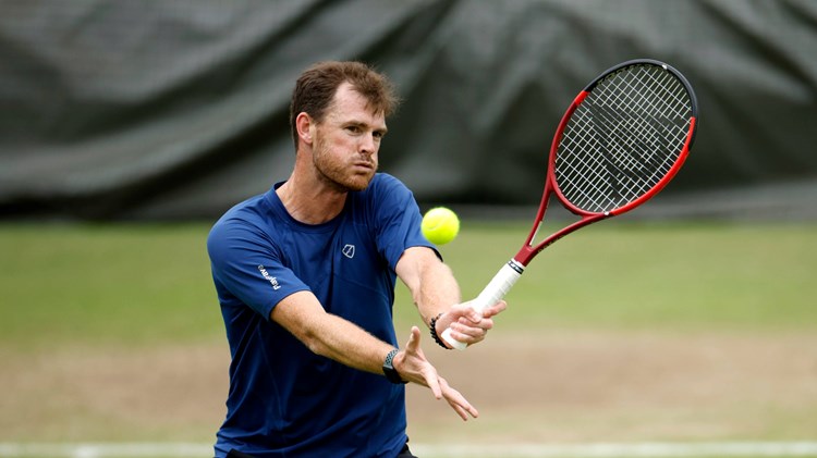 Jamie Murray hitting a volley during training at Wimbledon