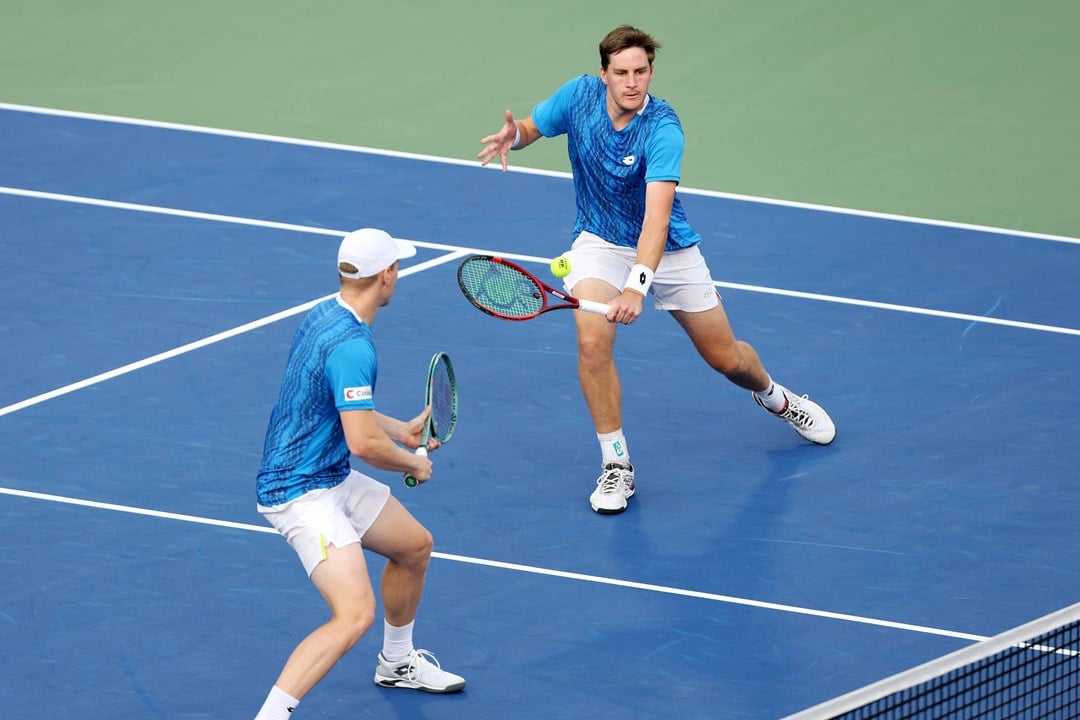 Henry Patten stretching for a volley at the Dubai Duty Free Tennis Championships