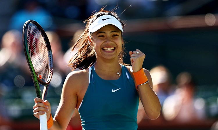 Emma Raducanu celebrating winning a tough battle against Caroline Garcia at Indian Wells 2022
