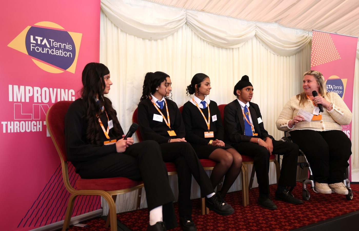 Louise Hunt Skelley at LTA TF Parliament Reception with students from Pioneer Academy