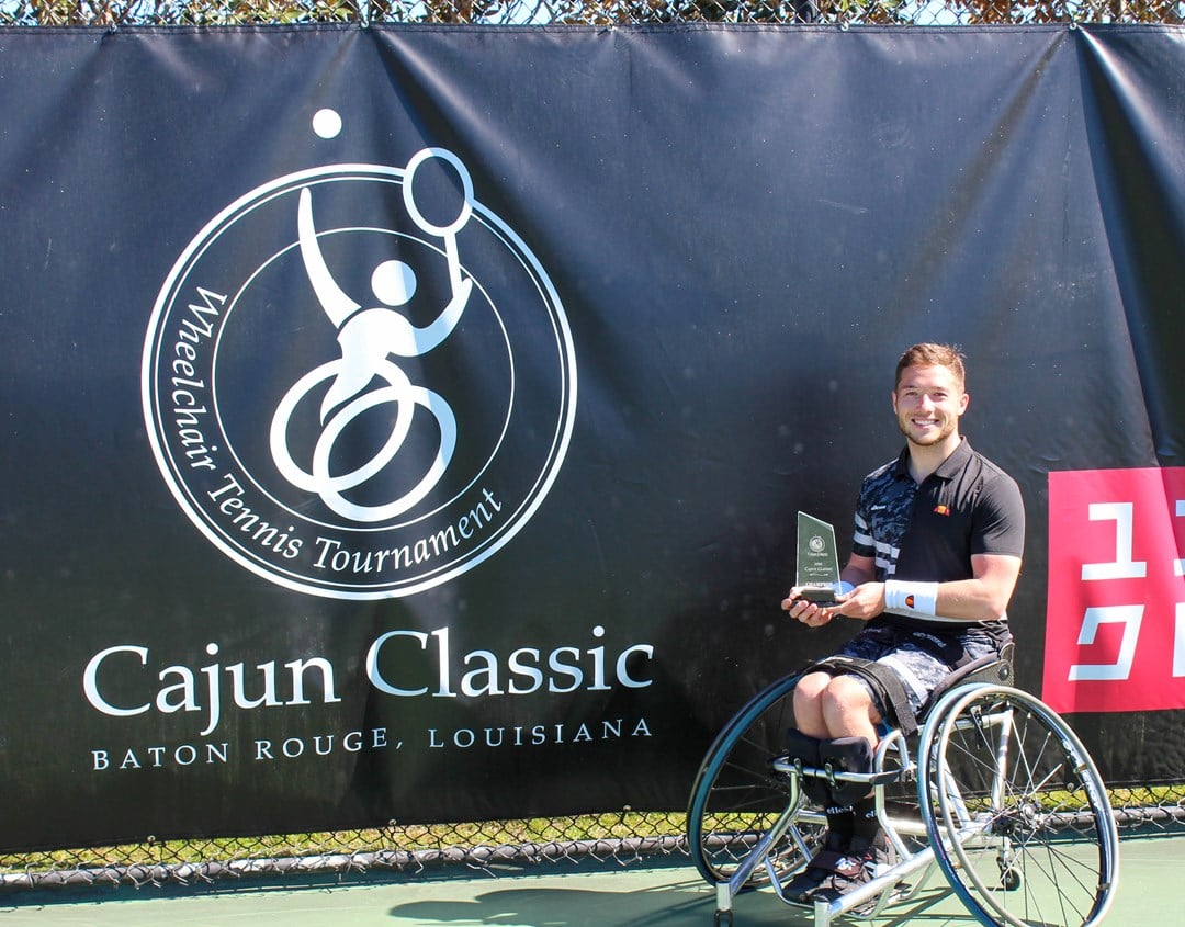 Alfie Hewett holding the 2022 Cajun Classic singles trophy