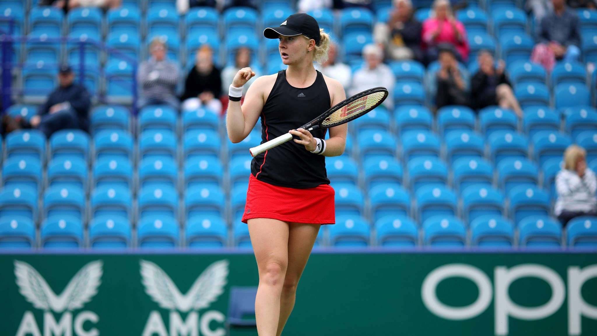 Fran Jones celebrating a point at the Eastbourne International